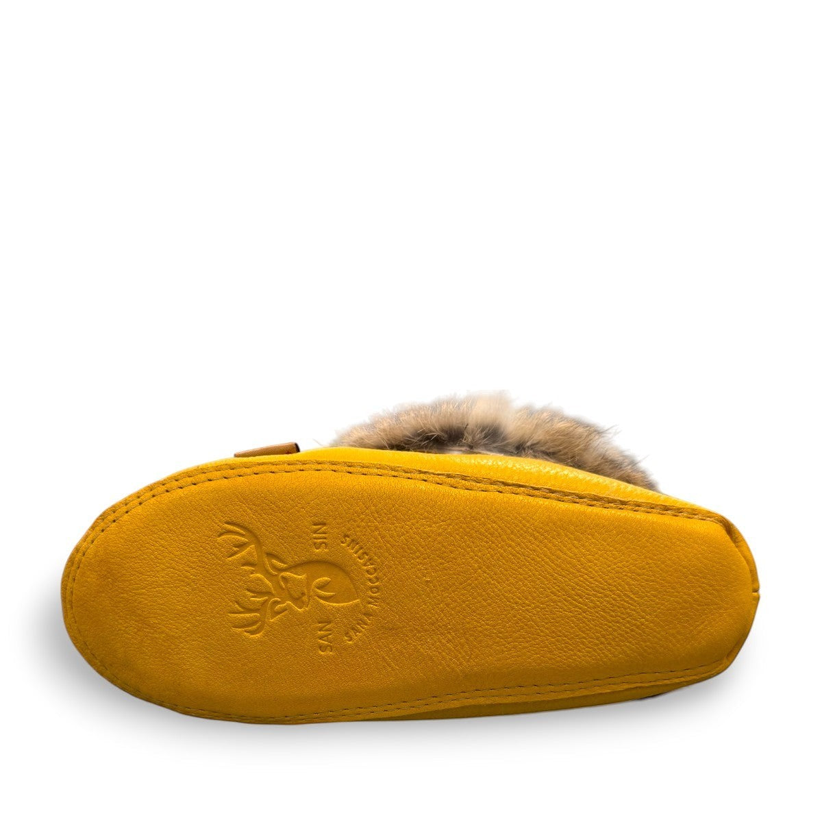 Alberta yellow deer skin leather moccasins with a soft rabbit fur ankle collar, handcrafted design.
photo of the bottom side