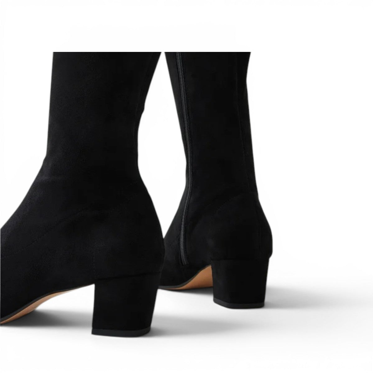 Django & Juliette black microsuede knee-high boots with square toe, block heel, and gold buckle detail.
photo of the back side
