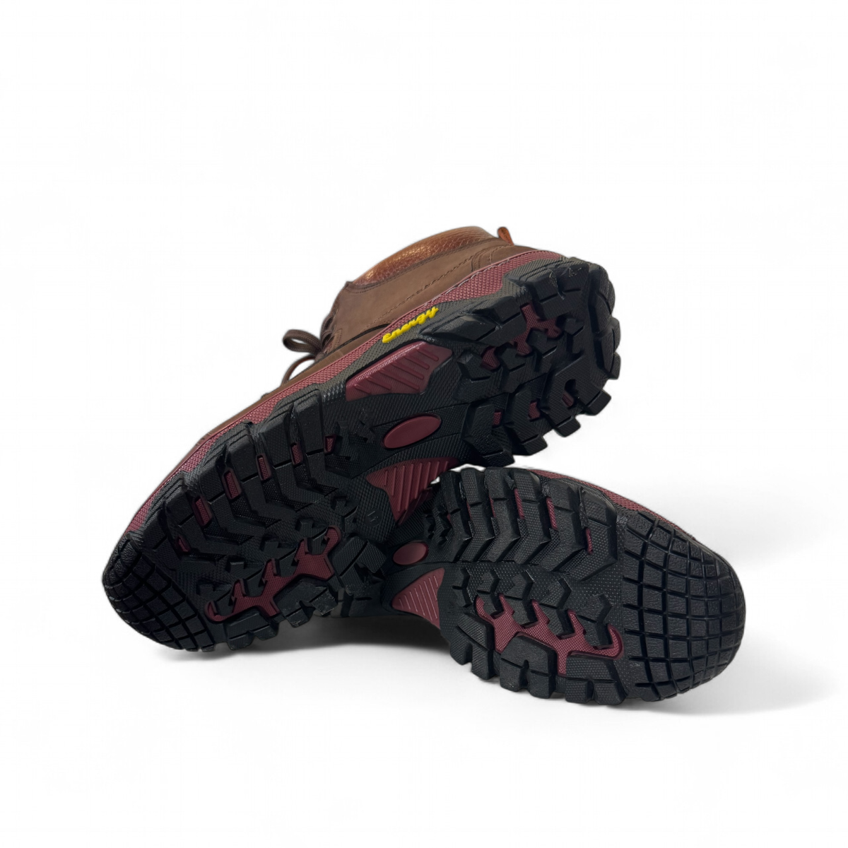 Satel Sistan suede dark brown lace-up boots with a durable rubber outsole and detailed stitching. Photo of bottom view.