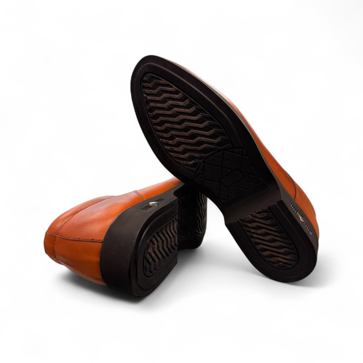 Sun Pourya brown leather lace-up dress shoe with textured toe detail and durable rubber sole. Photo of bottom view.