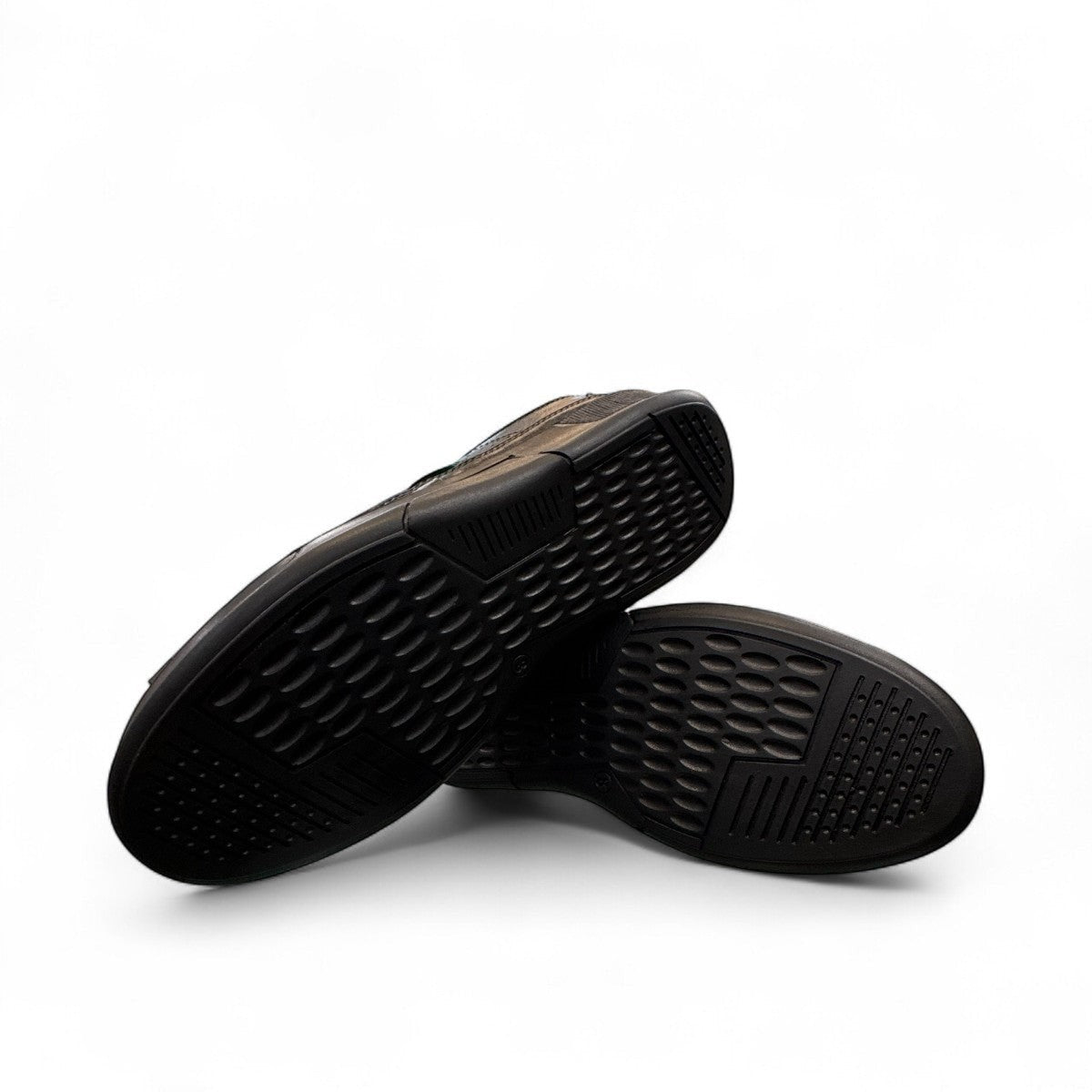 Atropat Abyaneh black leather slip-on shoes with handmade stitching and durable rubber outsole. Photo of bottom view.