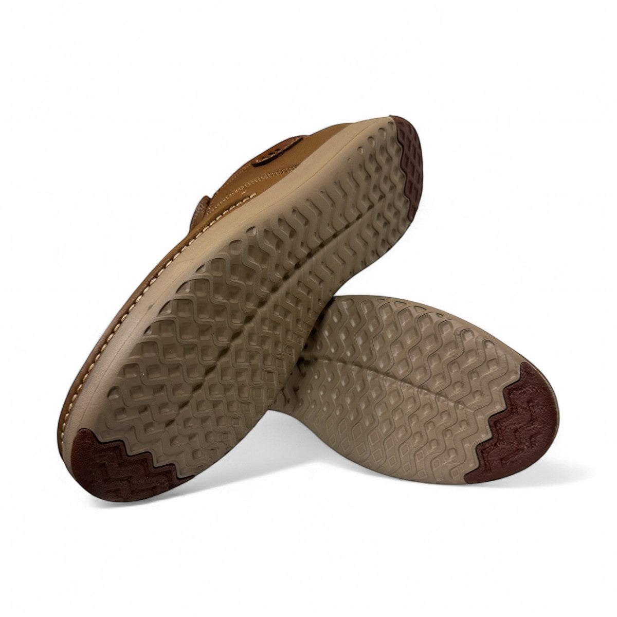 Atropat Saadi brown leather slip-on shoes with handmade stitching and durable rubber outsole. Photo of bottom view.