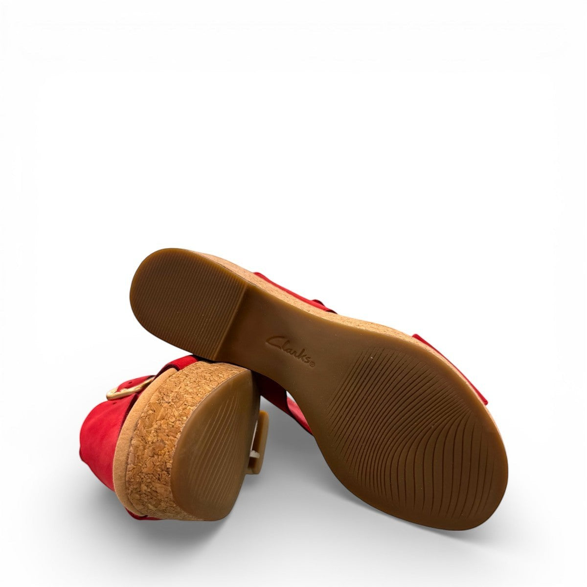 Clarks Giselle Dove cherry nubuck wedge sandal with an adjustable strap and cork heel. photo of the bottom.