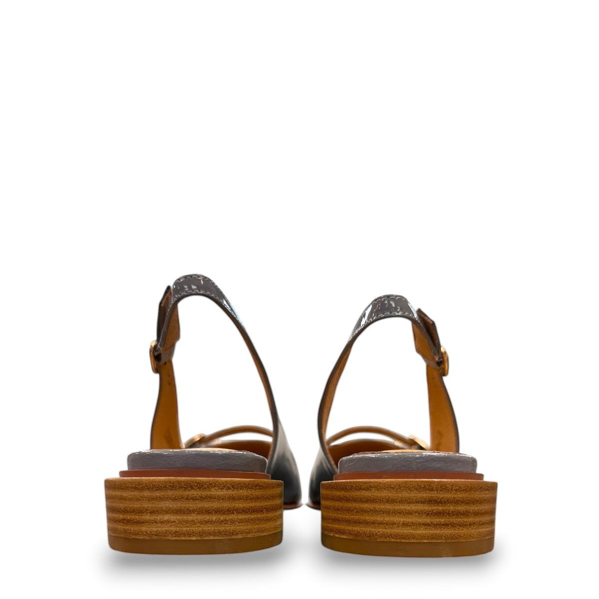 DJANGO & JULIETTE Eshano denim blue patent leather slingback flat with triple buckle detail and low heel. back view.