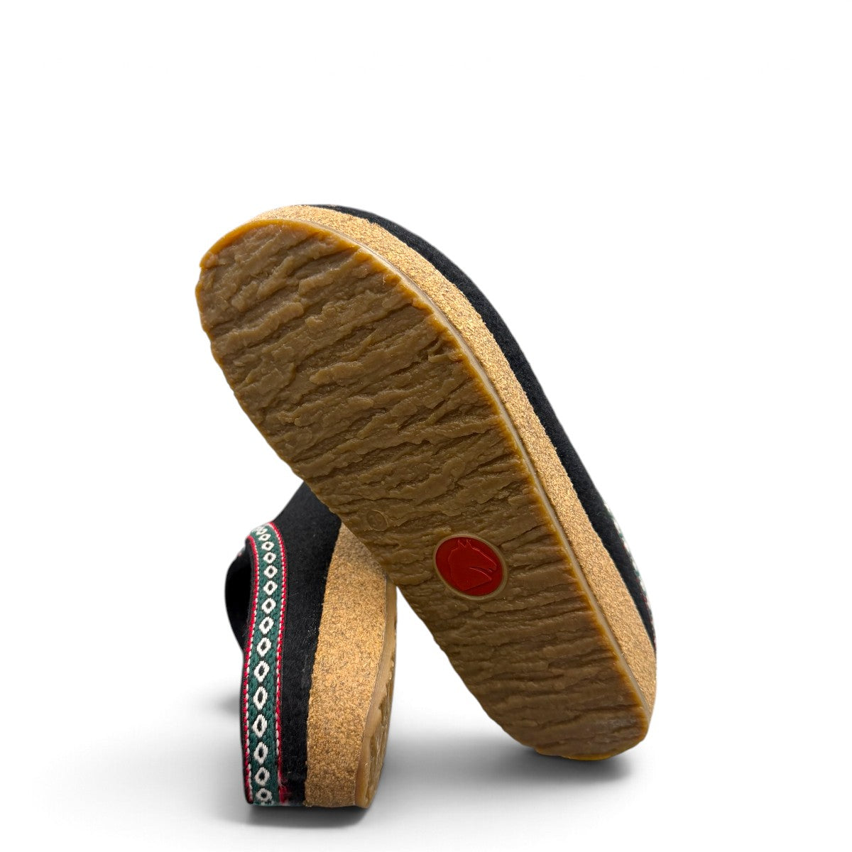 Haflinger GZ black wool felt clog with decorative trim and anatomically contoured cork midsole. Photo of bottom view.