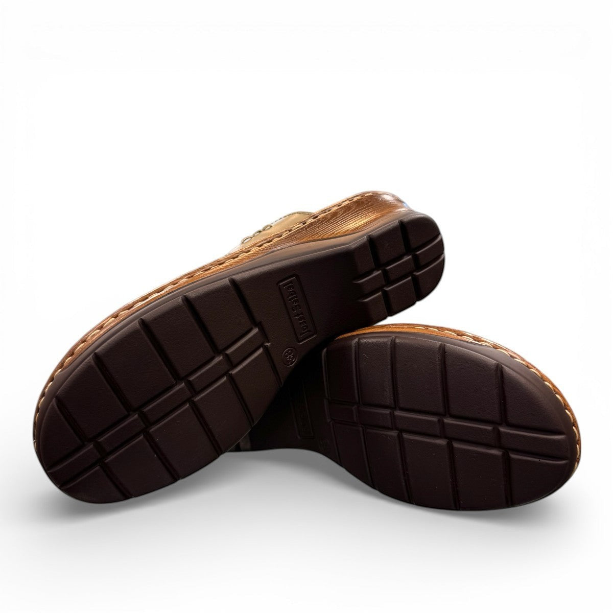 Josef Seibel Catalonia 86 cognac and beige leather wedge slide sandals with open toe design. photo of the bottom.