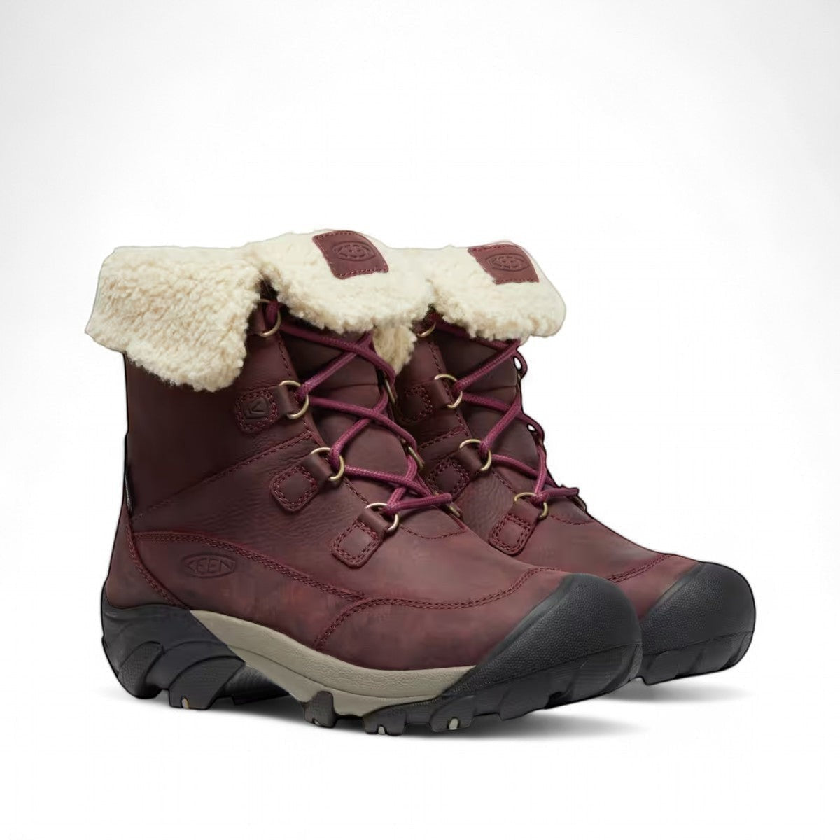 KEEN Betty waterproof winter boot in burgundy leather with a beige faux-fur cuff and rubber outsole