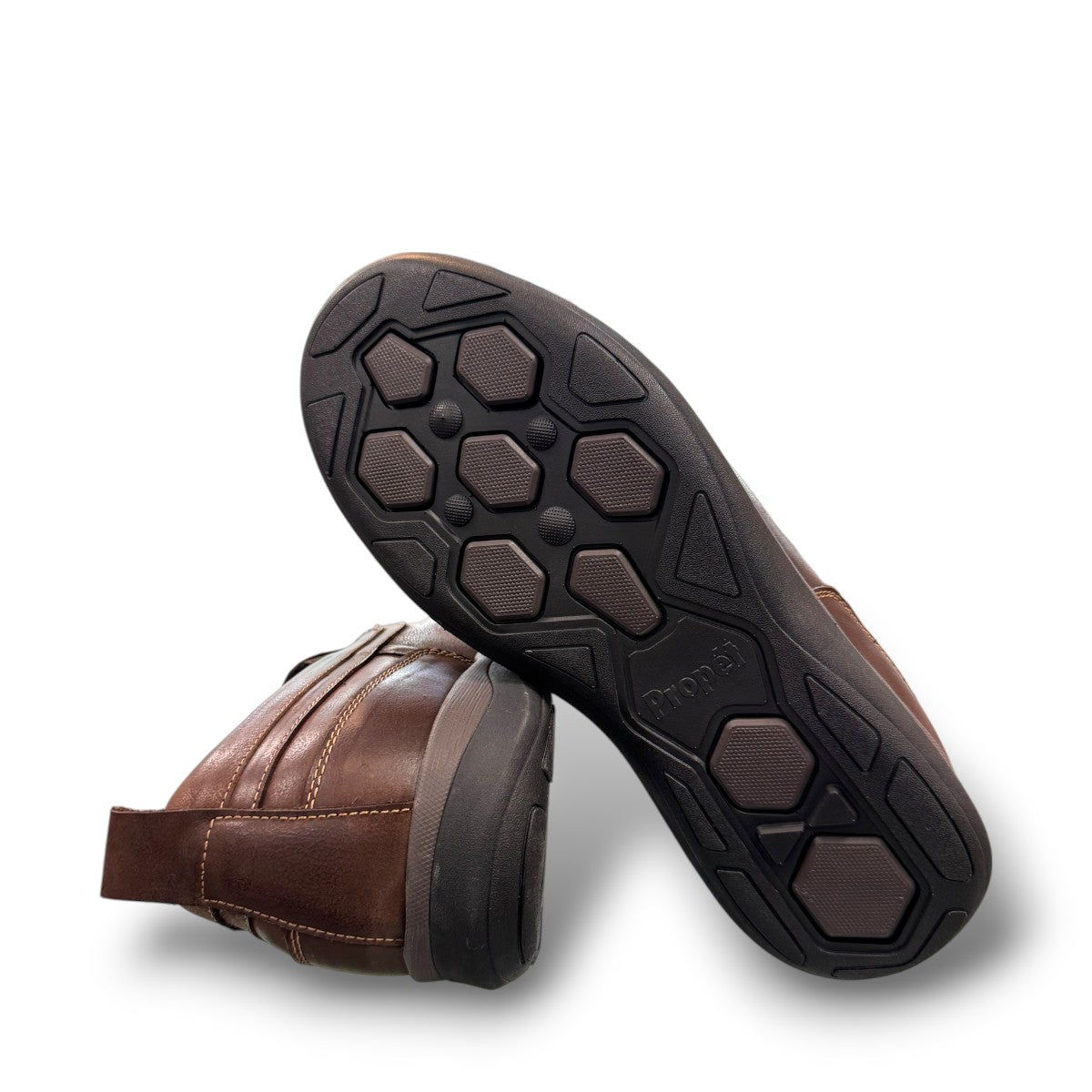 Propet Preston coffee brown leather slip-on boat shoe with twin gore detailing and flexible EVA outsole.
photo of the bottom side