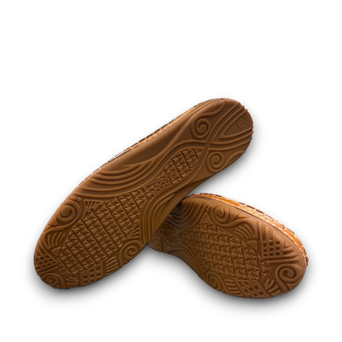 Roamers Atzi eggnog leather flat with cutout details and cushioned footbed.
photo of the bottom side