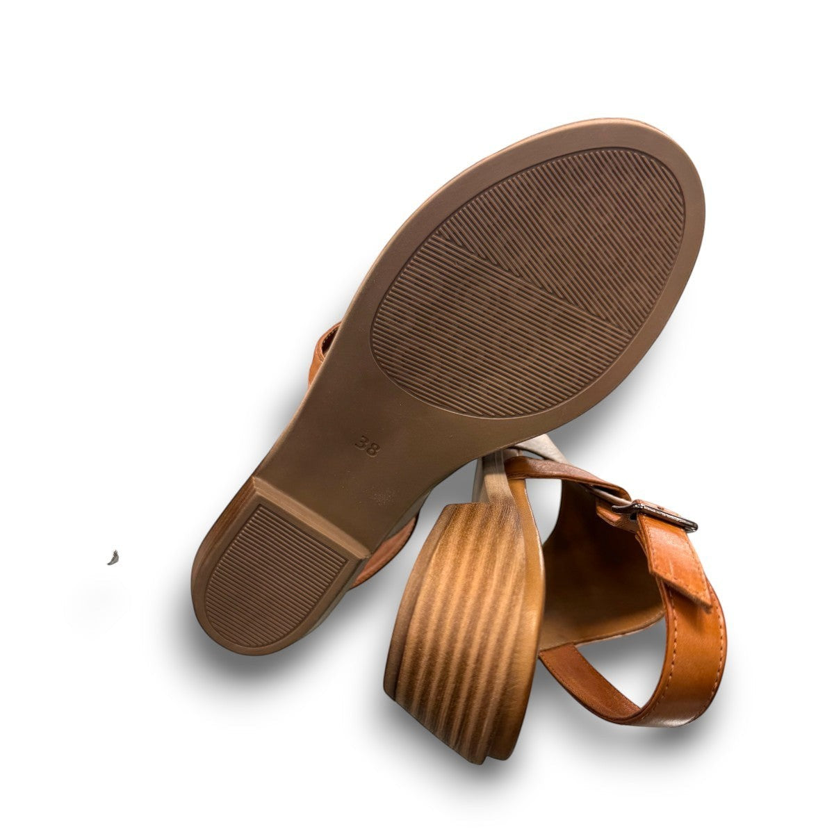 Roamers Jude low heel sandal in silver grey leather with a tan strap and side buckle closure.
photo of the bottom side