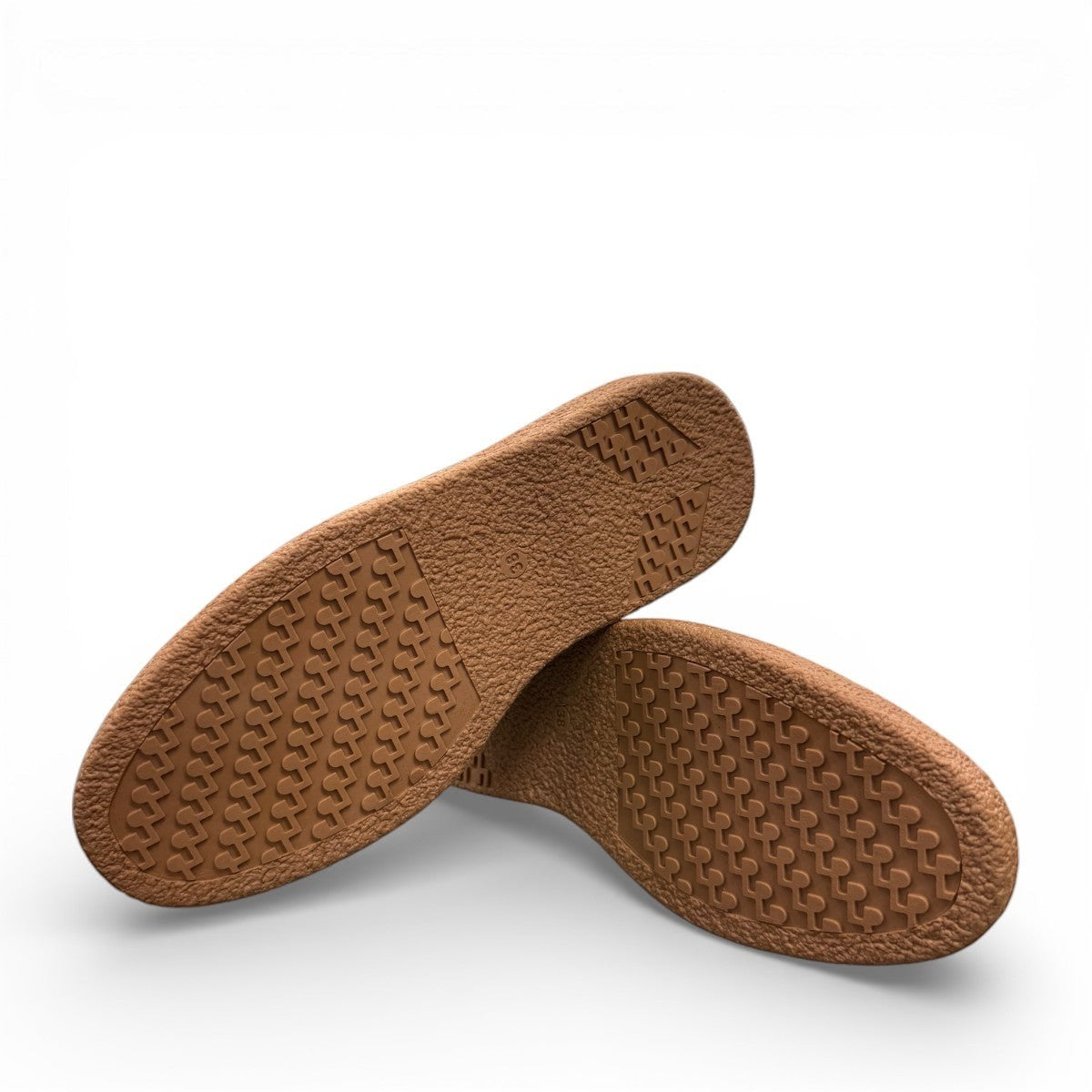 Roamers Nila metallic teal leather loafer with a brown platform sole and moccasin-style stitching.
photo of the bottom side