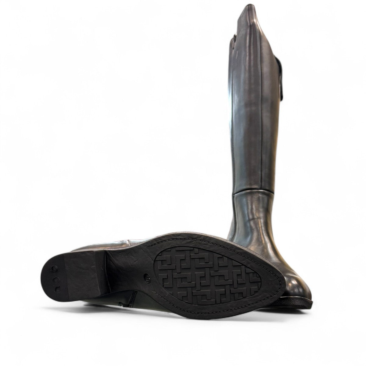 Roamers Peace black leather knee-high boot with block heel and decorative side zipper.
photo of the bottom side