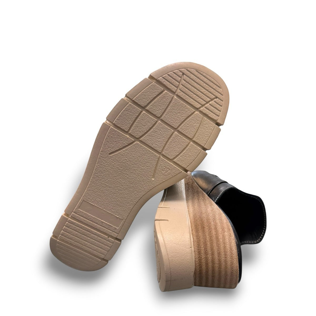 Roamers Veronica black leather slip-on wedge sandal with a knotted detail and platform sole.
photo of the bottom side