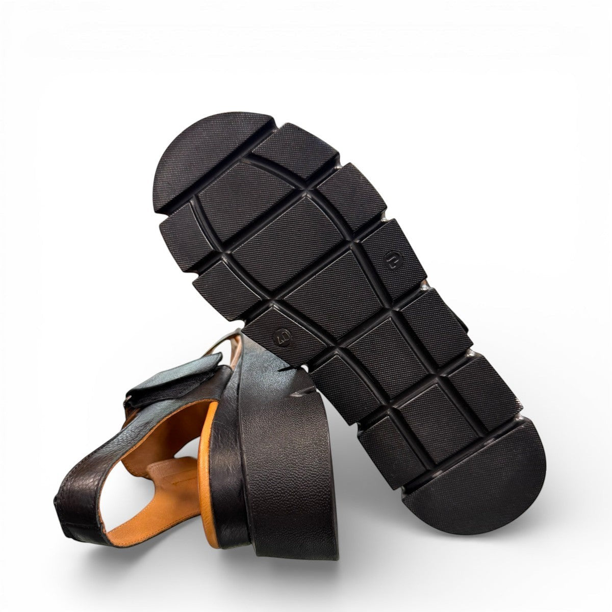 Roamers Ulyana 01 black leather platform sandal with adjustable straps and tan insole.
photo of the bottom side