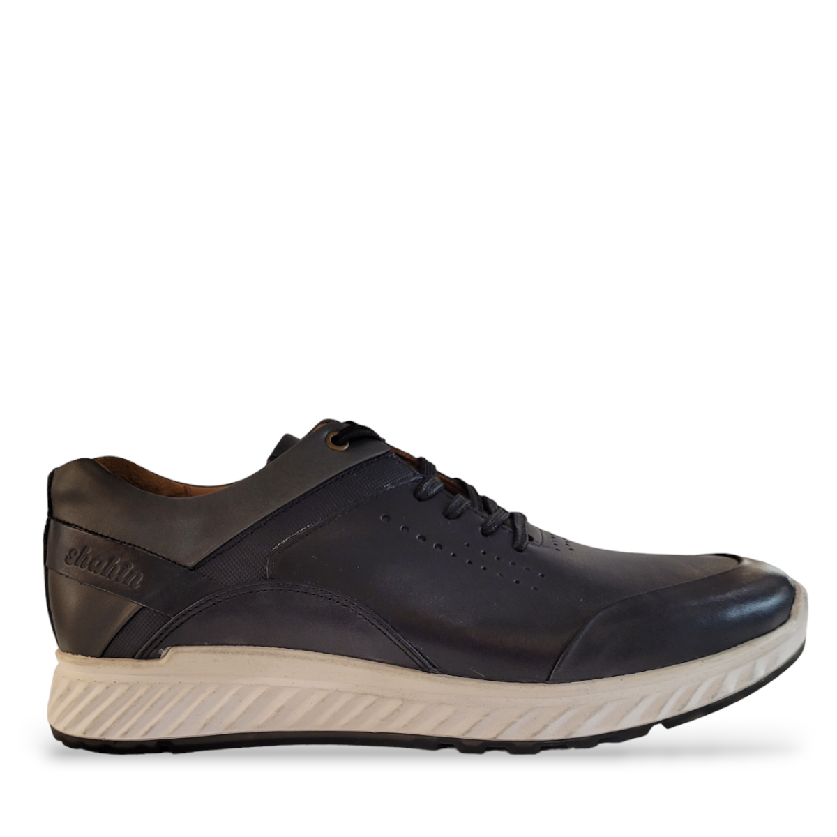 Shahin Abtin black leather men's casual sneaker with a white textured sole and side branding. Photo of side view.