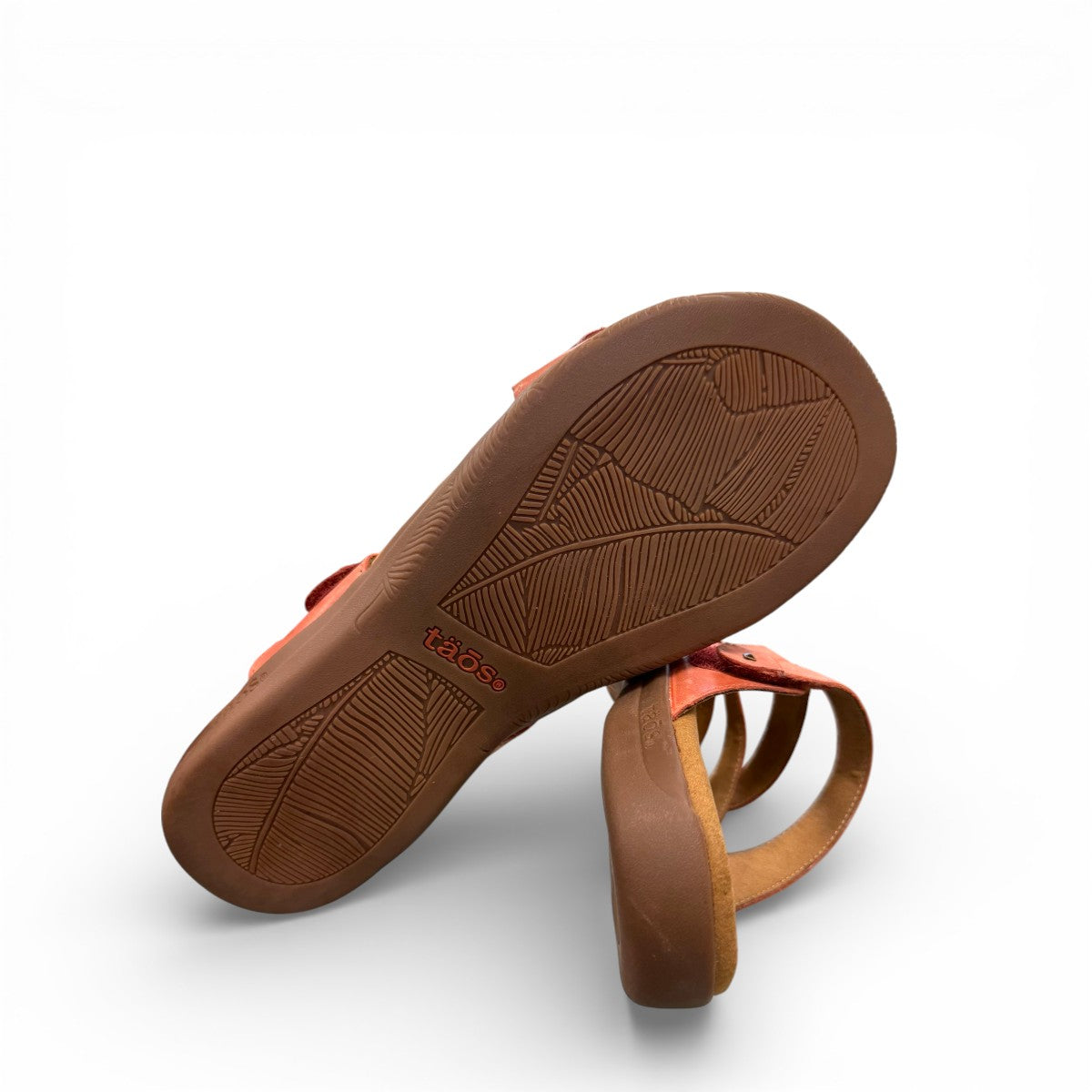 Taos Double U leather slide sandals in bruschetta red with adjustable hook and loop straps. Photo of bottom view.