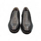 AFAG 4004 black leather slip-on men's shoes with a durable rubber outsole and side stitching detail. Photo of upper view.