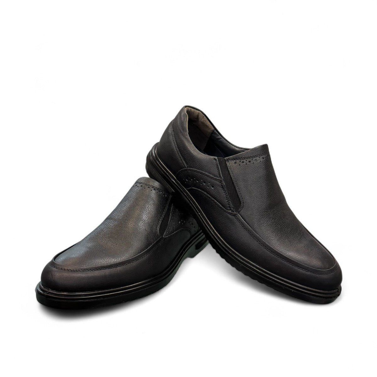 AFAG 4004 black leather slip-on men's shoes with a durable rubber outsole and side stitching detail. Photo of front side view.