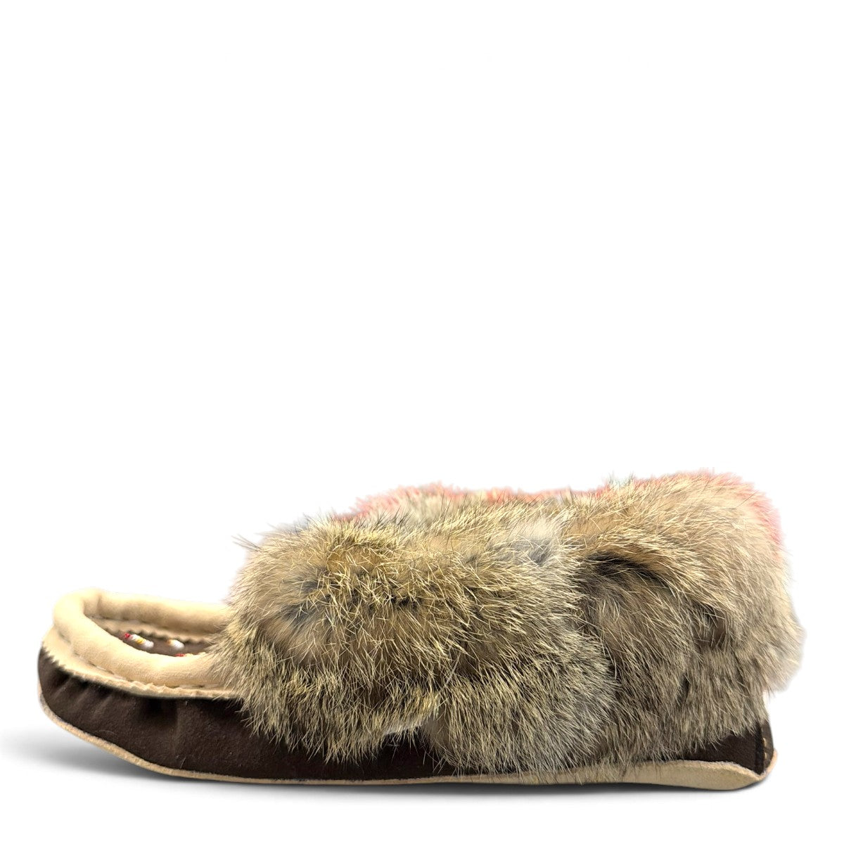 Alberta brown suede moccasin with cream trim and fluffy rabbit fur ankle collar, side view. Photo of left side view.