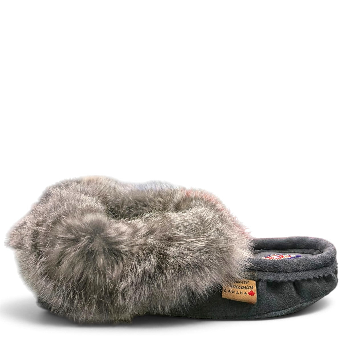 Alberta dark grey suede moccasins with a plush rabbit fur ankle collar, handcrafted for comfort. Photo of right side view.