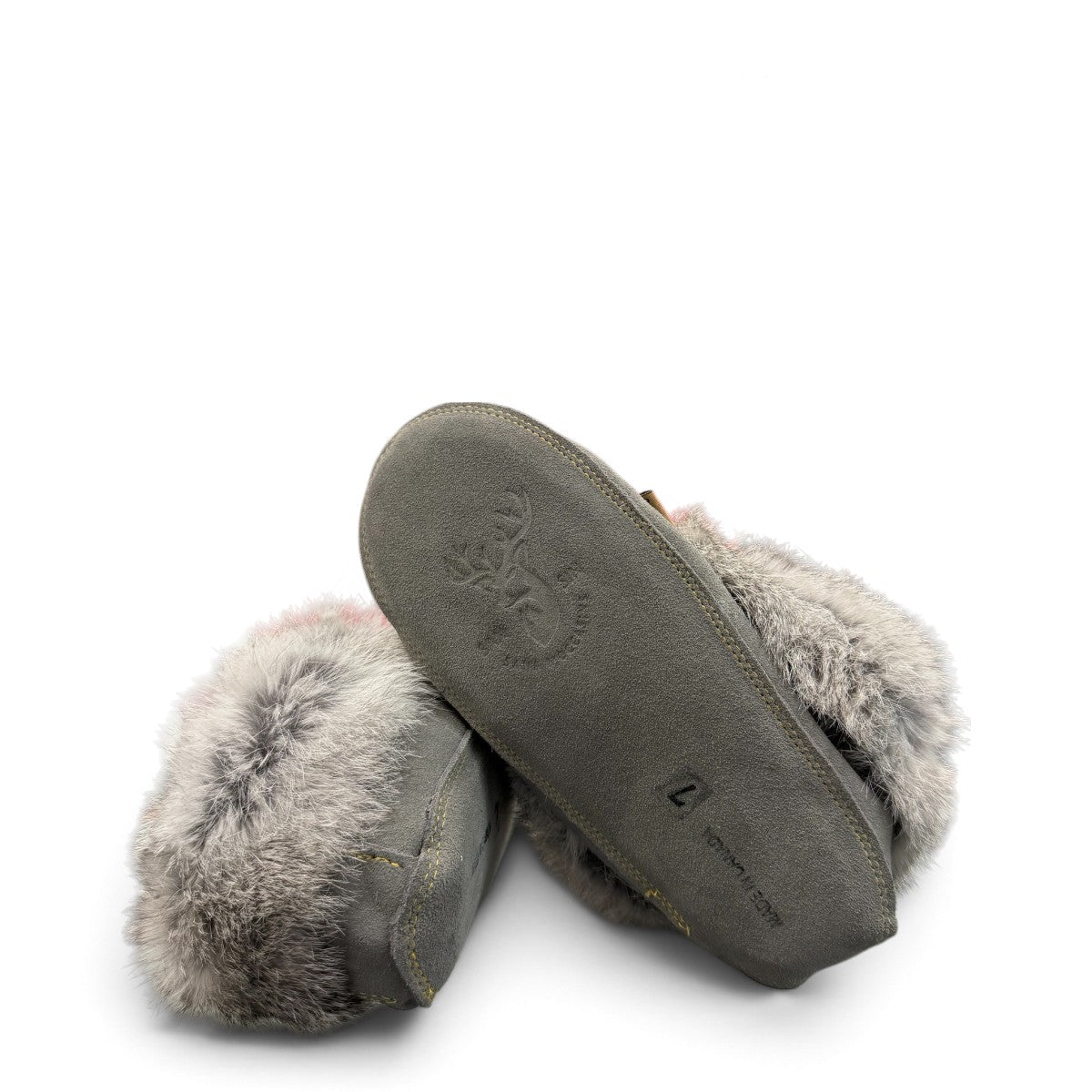 Alberta light grey suede moccasin with a fluffy rabbit fur ankle collar, handcrafted side view. Photo of bottom view.