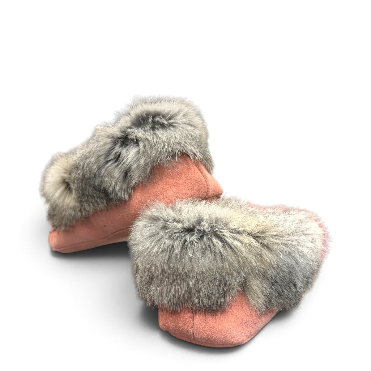 Alberta pink suede moccasins with a soft rabbit fur ankle collar, handcrafted for cozy comfort. Photo of back view.