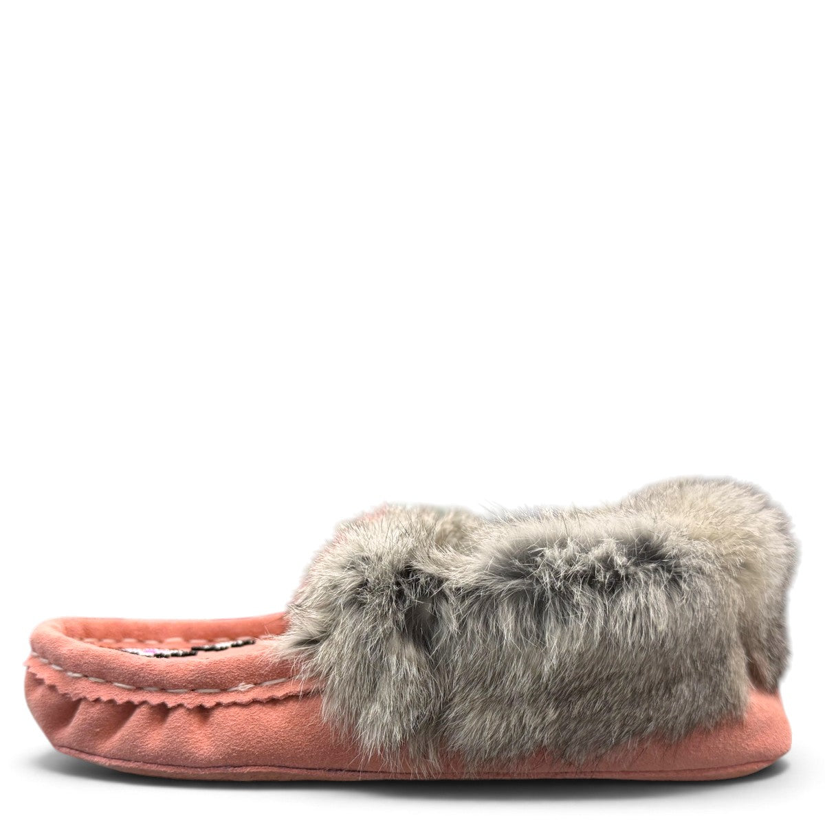 Alberta pink suede moccasins with a soft rabbit fur ankle collar, handcrafted for cozy comfort. Photo of left side view.