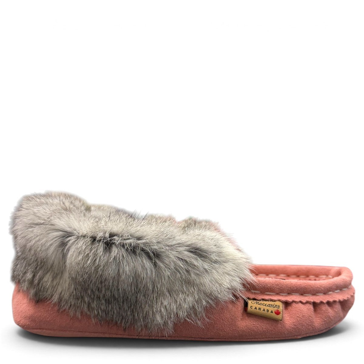 Alberta pink suede moccasins with a soft rabbit fur ankle collar, handcrafted for cozy comfort. Photo of right side view.