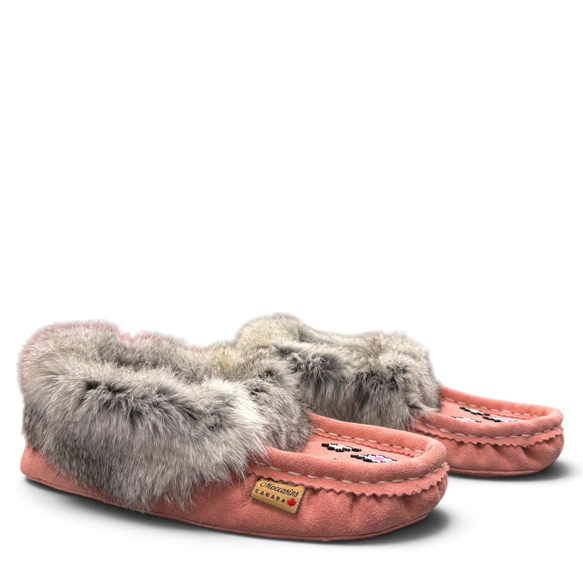 Alberta pink suede moccasins with a soft rabbit fur ankle collar, handcrafted for cozy comfort. Photo of side views.