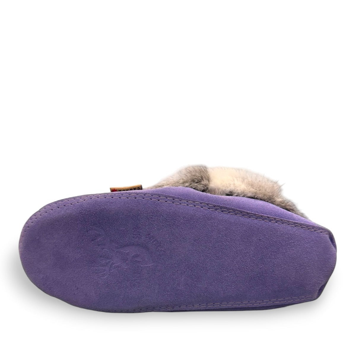 Alberta  purple cowhide suede moccasins with a soft rabbit fur ankle collar, handcrafted for cozy comfort.
photo of the bottom side
