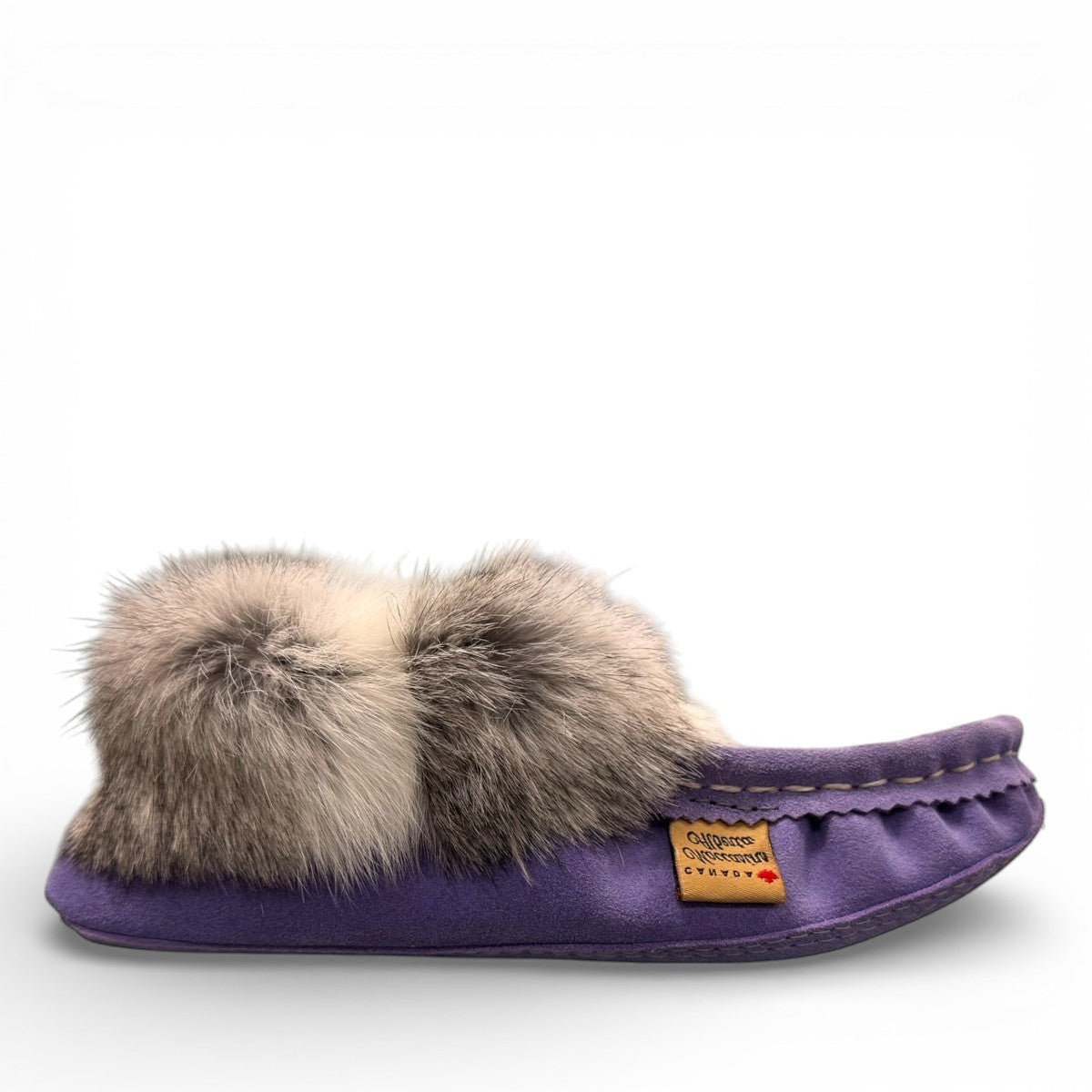 Alberta  purple cowhide suede moccasins with a soft rabbit fur ankle collar, handcrafted for cozy comfort.
photo of the right side