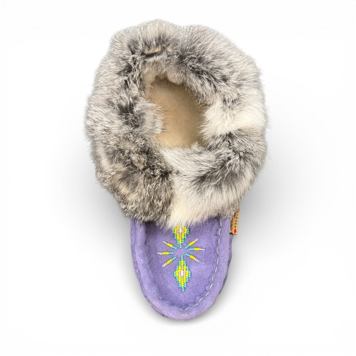 Alberta  purple cowhide suede moccasins with a soft rabbit fur ankle collar, handcrafted for cozy comfort.
photo of the top side