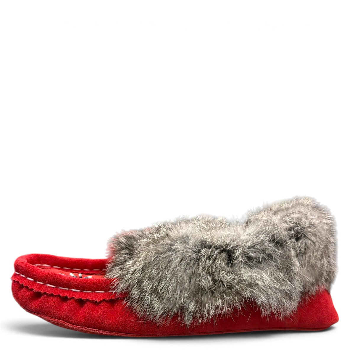 Alberta red suede moccasins with a fluffy rabbit fur ankle collar, handcrafted for cozy comfort. Photo of left side view.