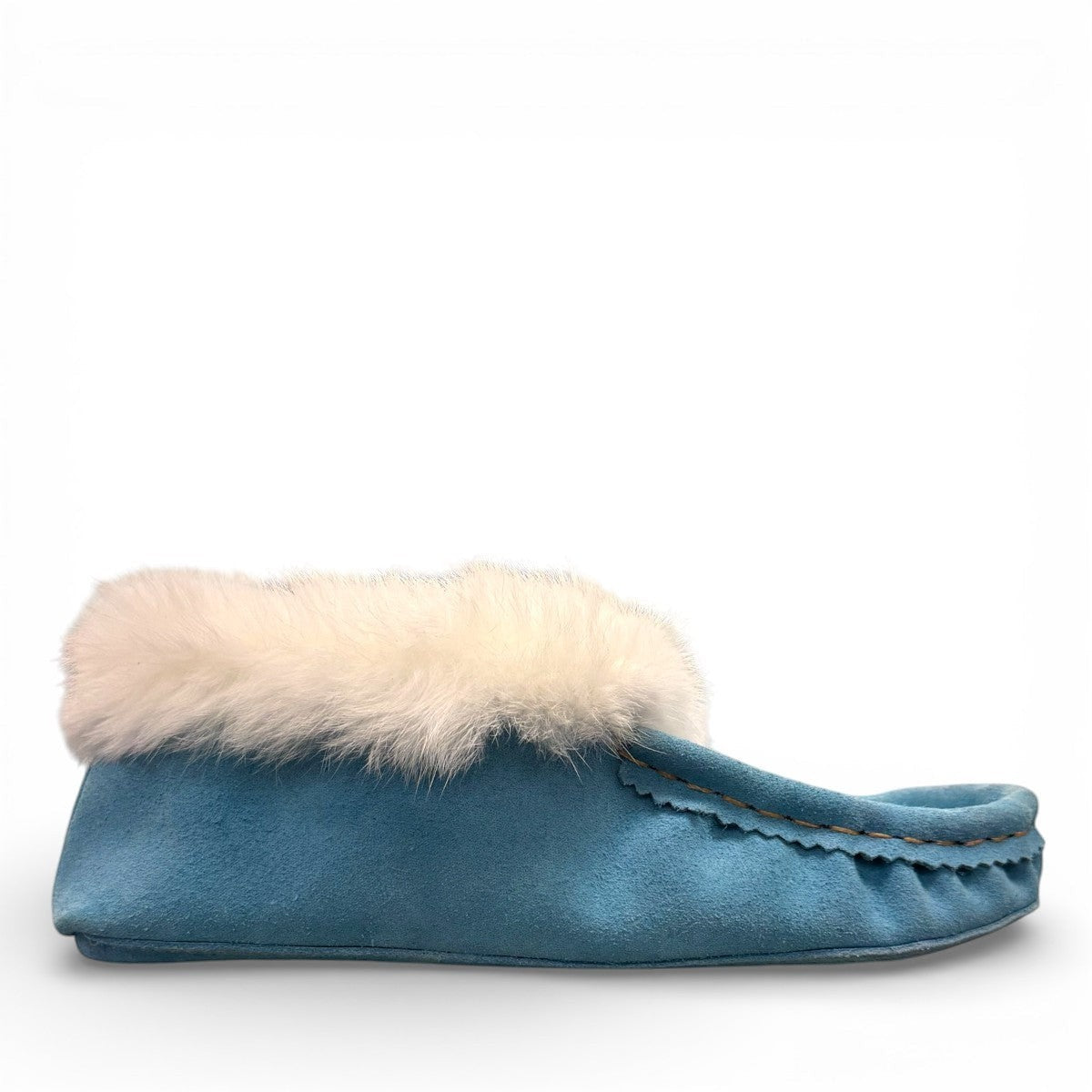 Alberta turquoise cowhide suede moccasins with a soft white rabbit fur ankle trim, handcrafted design.
photo of the right side