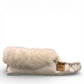 Alberta  white leather moccasins featuring a plush fur collar and side brand tag, side view.
photo of the right side