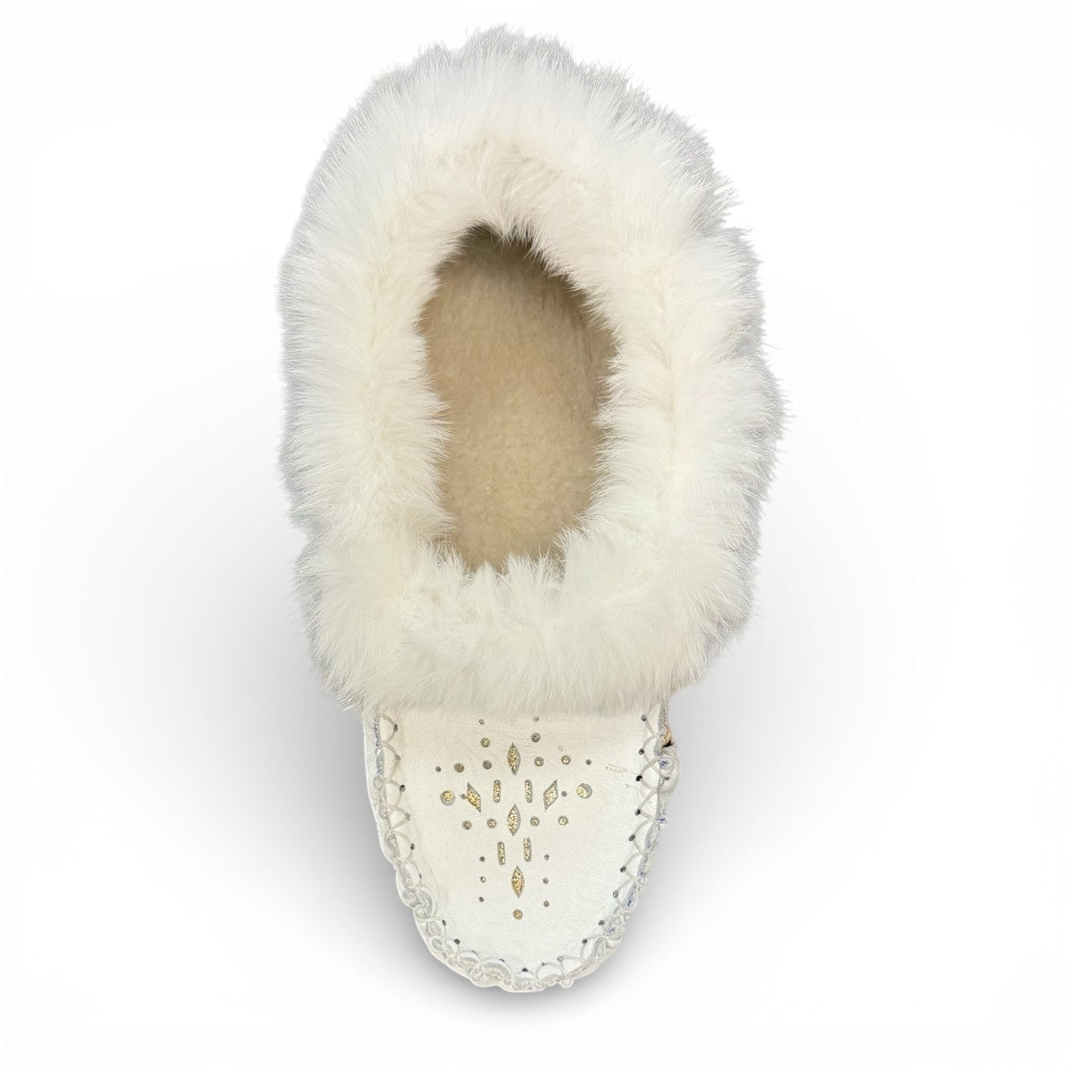 Alberta  white leather moccasins featuring a plush fur collar and side brand tag, side view.
photo of the top side
