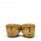 Alberta moccasins yellow caribou hide leather moccasins with a soft double leather sole and brown lace-up closure.
photo of the back side