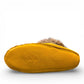 Alberta yellow deer skin leather moccasins with a fluffy rabbit fur ankle collar, handcrafted design.
photo of the bottom side