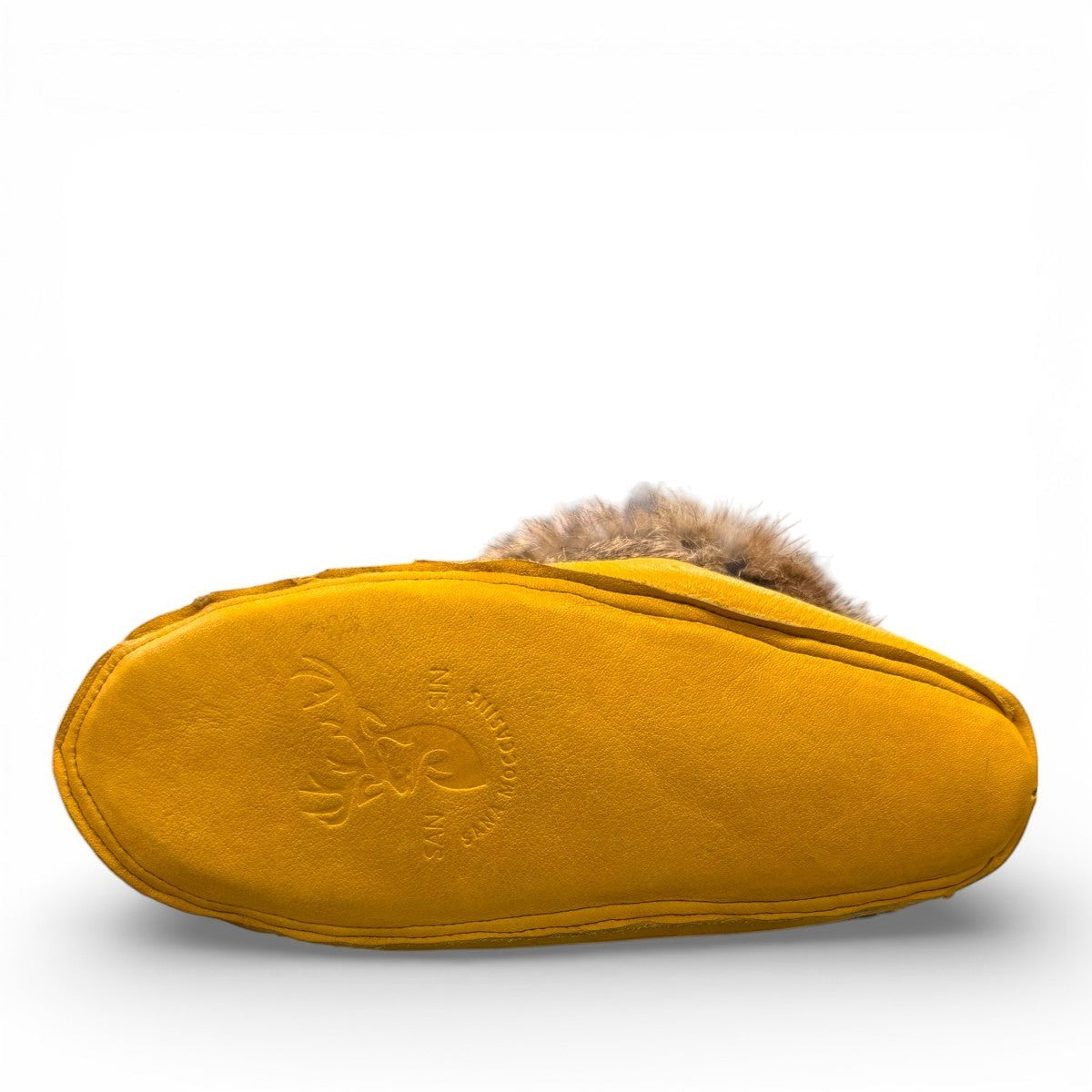 Alberta yellow deer skin leather moccasins with a fluffy rabbit fur ankle collar, handcrafted design.
photo of the bottom side