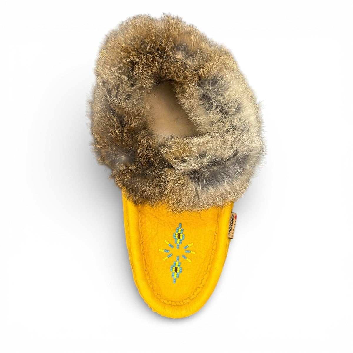 Alberta yellow deer skin leather moccasins with a soft rabbit fur ankle collar, handcrafted design.
photo of the top side
