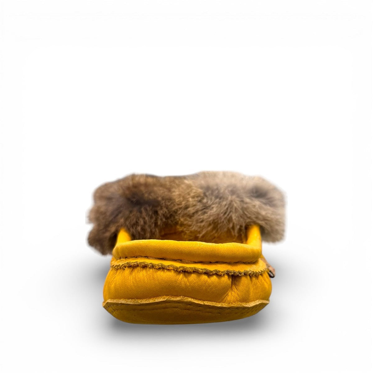 Alberta yellow deer skin leather moccasins with a soft rabbit fur ankle collar, handcrafted design.
photo of the front side