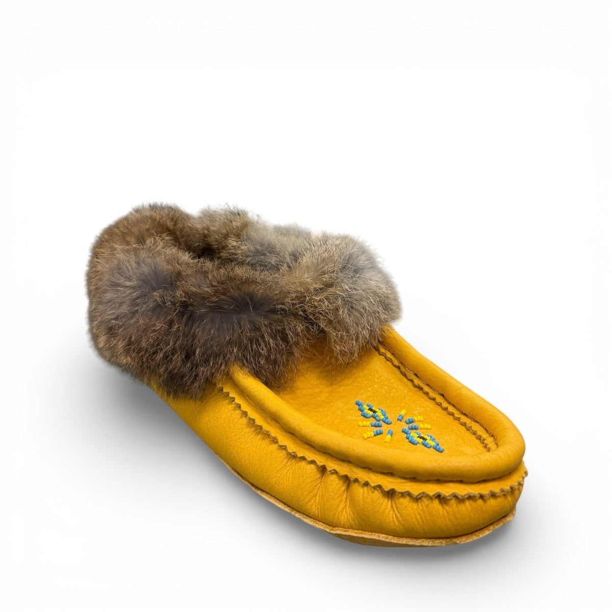 Alberta yellow deer skin leather moccasins with a soft rabbit fur ankle collar, handcrafted design.
photo of the front side