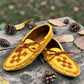 Alberta moccasins yellow caribou hide leather moccasins with a soft double leather sole and brown lace-up closure.
photo of the front side