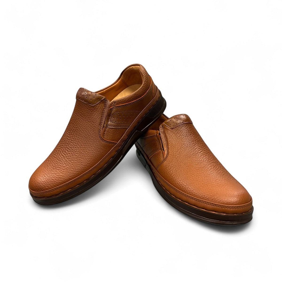 Atropat Abyaneh brown leather slip-on shoes with textured upper and durable rubber sole. Photo of upper view.