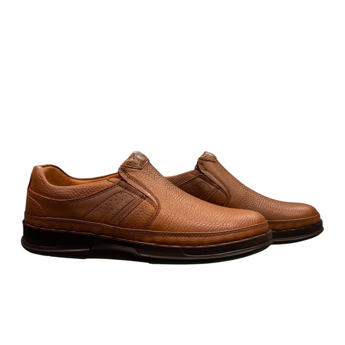 Atropat Abyaneh brown leather slip-on shoes with textured upper and durable rubber sole. Photo of side views.