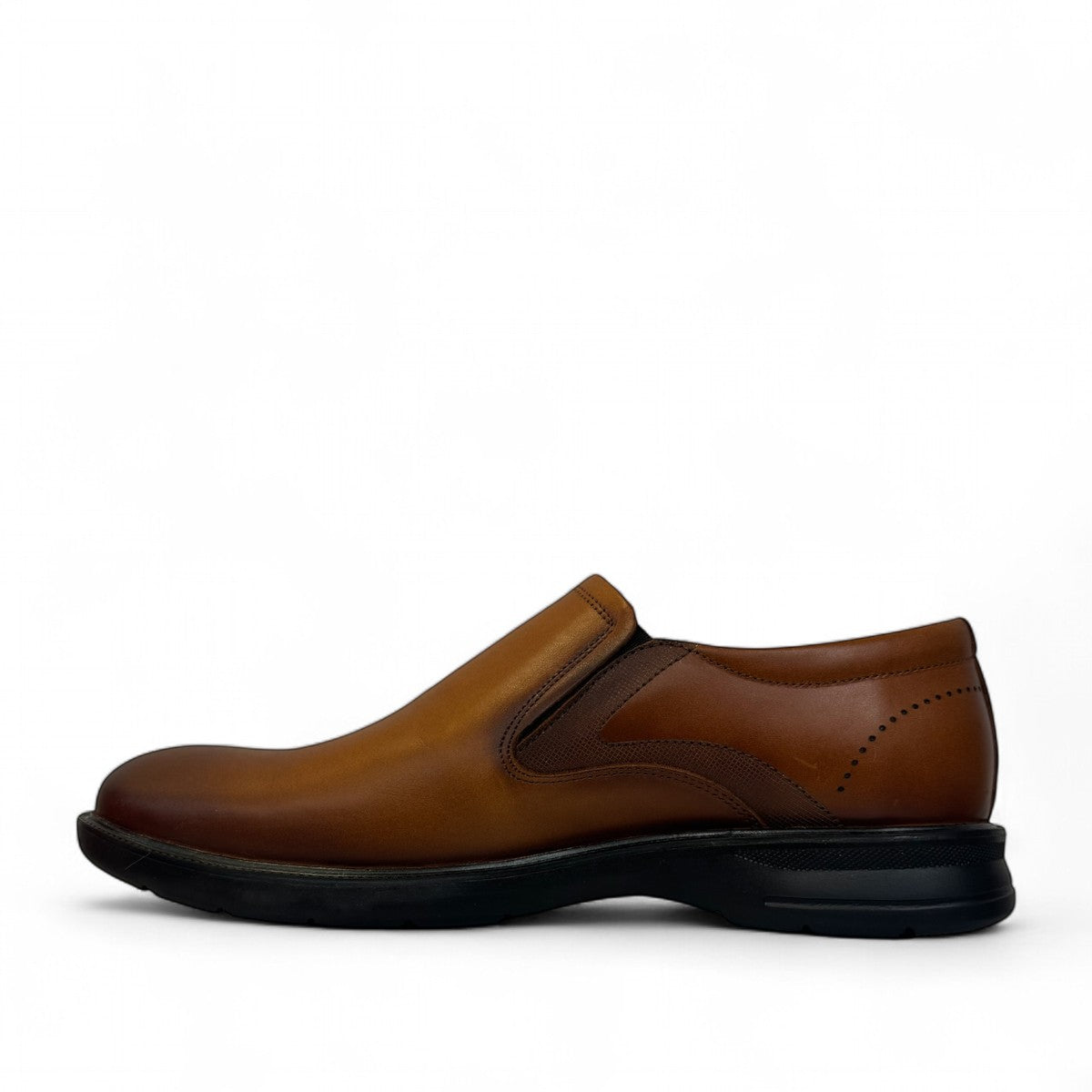 Atropat Aghdasieh brown leather slip-on shoe with handmade stitching and durable black rubber outsole. Photo of inside side view.