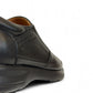 Atropat Azarbad black leather slip-on shoes with handmade stitching and durable rubber outsole. Photo of back side view 1.