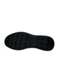 Atropat Azarbad black leather slip-on shoes with handmade stitching and durable rubber outsole. Photo of bottom view.