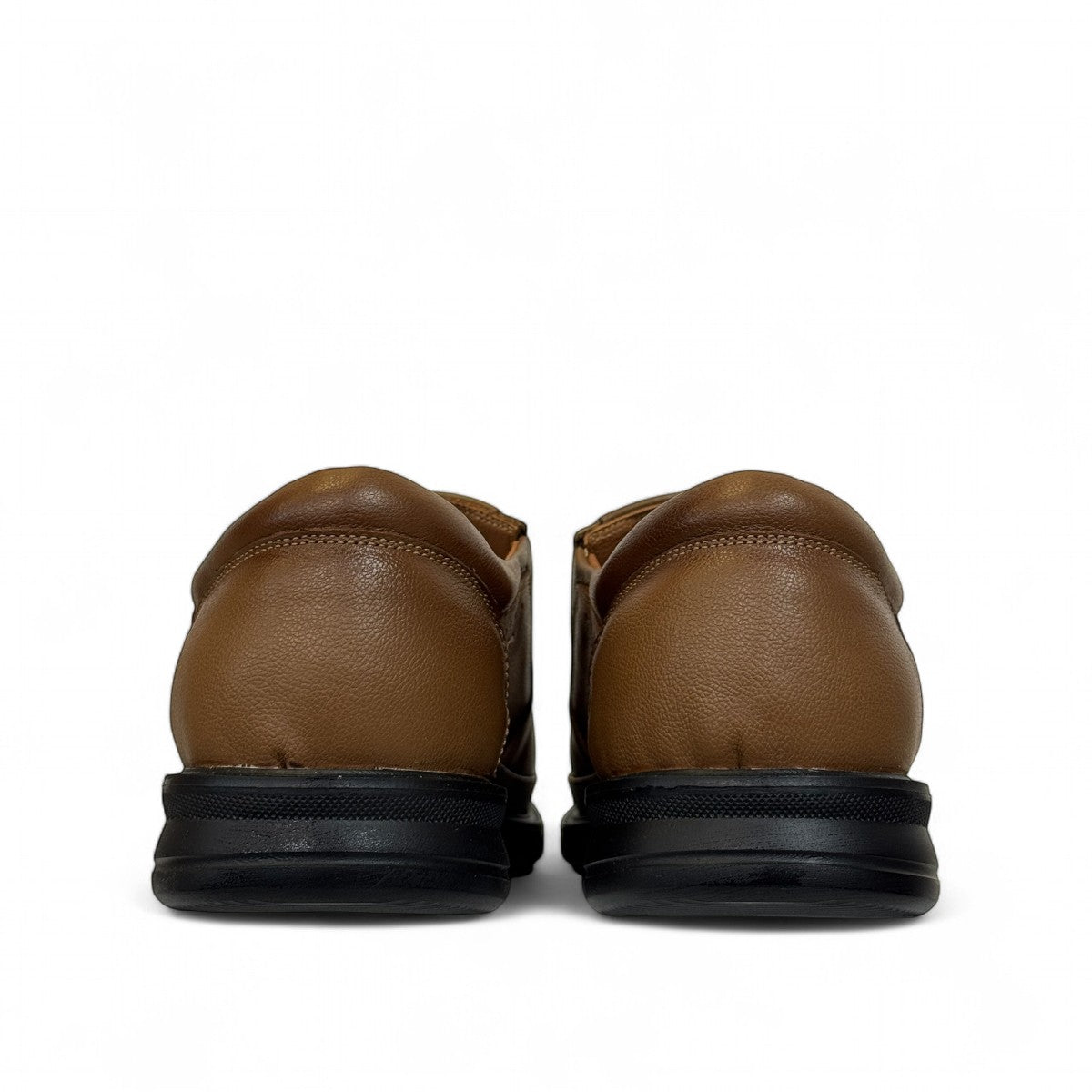 Atropat Azarbad brown leather slip-on shoes with handmade stitching and a durable black rubber sole. Photo of back view.
