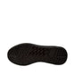 Atropat Azarbad brown leather slip-on shoes with handmade stitching and a durable black rubber sole. Photo of bottom view.